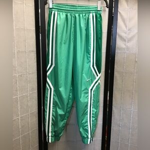 Nike Green Joggers with “Sample”Written and White Accents